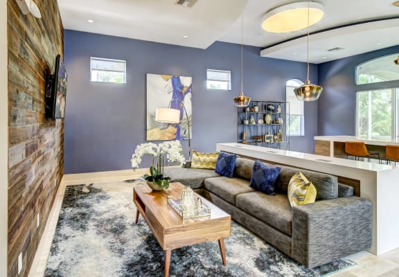 a living room with a couch and a coffee table
